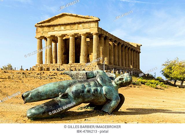 Statue of Icarus and the Temple of Concordia, Valle dei Templi, Agrigento, Sicily, Italy