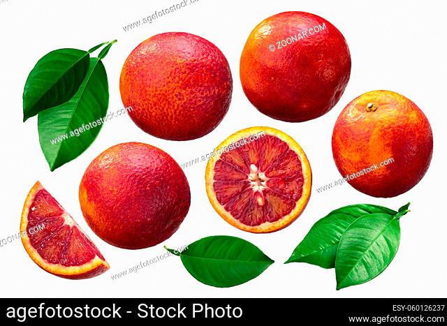 Blood oranges (Citrus x sinensis fruits), whole, halved and slices