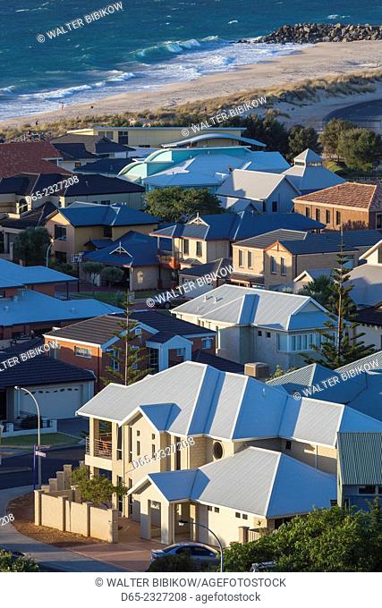 Australia, Western Australia, Bunbury, elevated view of beach houses from Marlston Hill, dusk