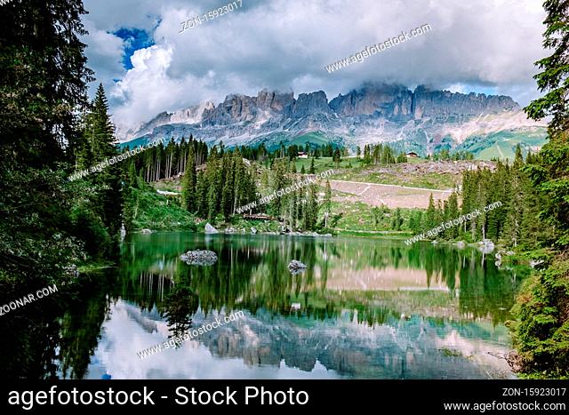 bleu lake in the dolomites Italy, Carezza lake Lago di Carezza, Karersee with Mount Latemar, Bolzano province, South tyrol, Italy