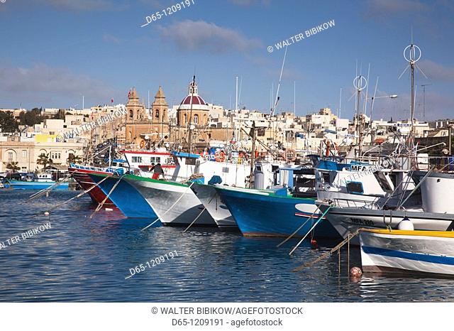 Malta, Southeast, Marsaxlokk, harbor and traditional Luzzu fishing boats