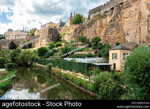 Alzette river Luxembourg city downtown Grund with medieval fortifications and vegetable gardens at riverside