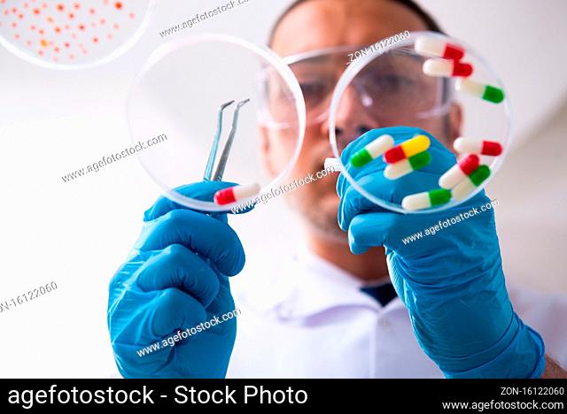 Young pharmacist working in the lab