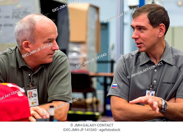 NASA astronaut Jeff Williams (left), Expedition 47 flight engineer and Expedition 48 commander; and Russian cosmonaut Sergei Volkov