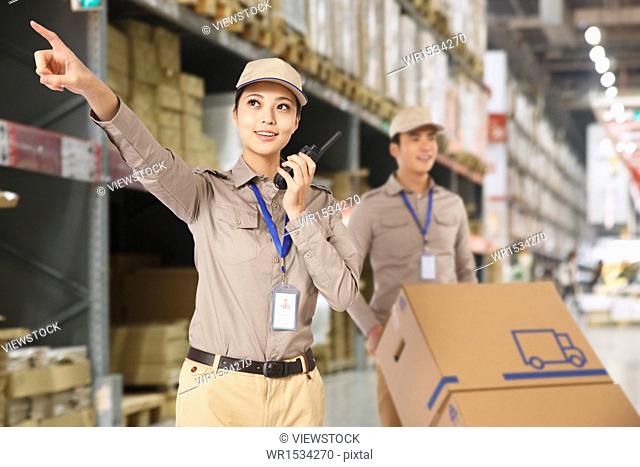 Oriental logistics personnel in the work