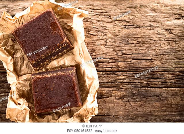 Blocks of chancaca or panela raw unrefined sugar made of sugarcane, used in Latin America to prepare sweet sauces and other sweets