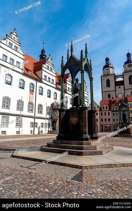 Wiitenberg, S-A / Germany - 13 September 2020: the historic market square in Wittenberg with the Luther memorial and the city hall building