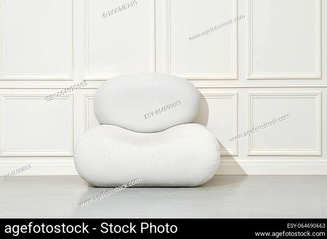 Large soft pouf or beanbag chair in bright room