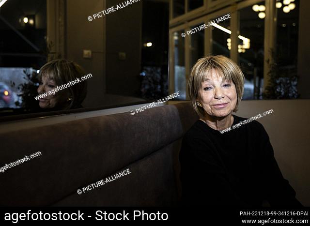 PRODUCTION - 18 December 2023, Berlin: Judy Winter, actress, sits in a Charlottenburg café at the end of an interview with the Deutsche Presse-Agentur on the...