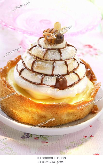 Lemon meringue tart with marzipan bee