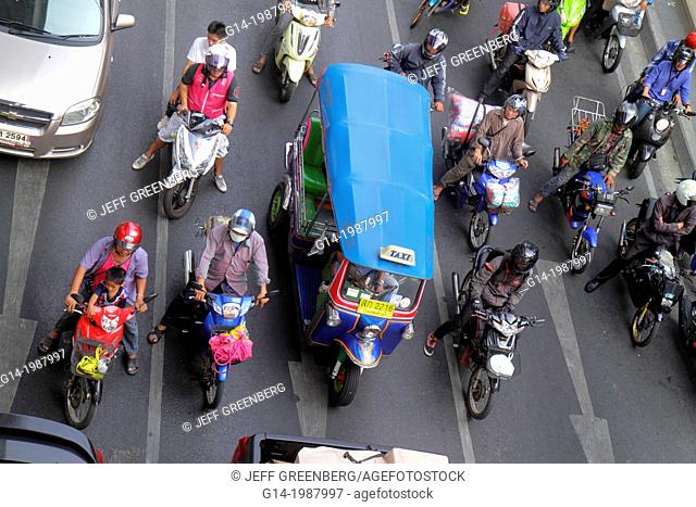 Thailand, Bangkok, Pathum Wan, Phaya Thai Road, traffic, taxi, taxis, cabs, motorcycles, motor scooters, auto rickshaw, tuk-tuk, sam-lor, Skywalk, view