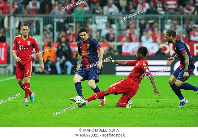 Munich's Franck Ribery (L) with David Alaba (2.R.) face Barcelona's Lionel Messi (2.L.) and Daniel Alves during the UEFA Champions League semi final first leg...