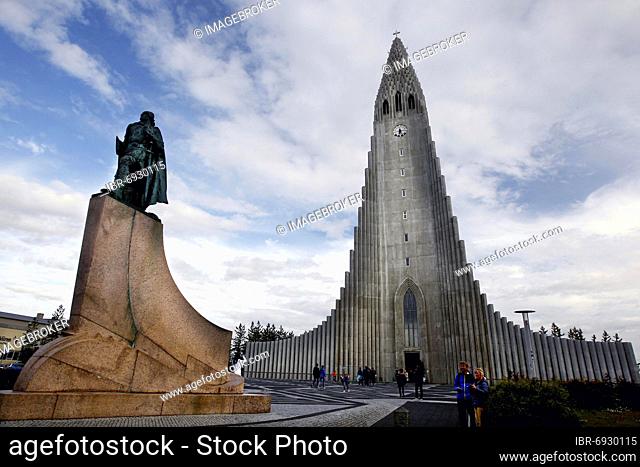 Hallgrimskirkja on city, church with concrete tower in form of column basalt, pedestal with monument of the Viking Leifur Eiriksson, Reykjavík, Iceland, Europe