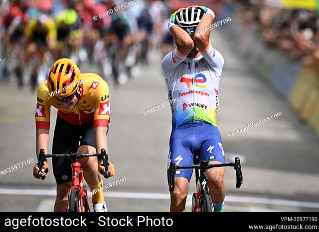 French Alexis Vuillermoz of Total Direct Energie celebrates as he crosses the finish line to win the second stage of the Criterium du Dauphine cycling race