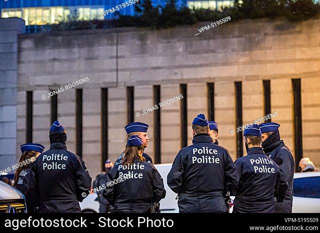 police officers pictured during a protest action early morning in the streets of Brussels of the LVC sector (location of car with a driver)