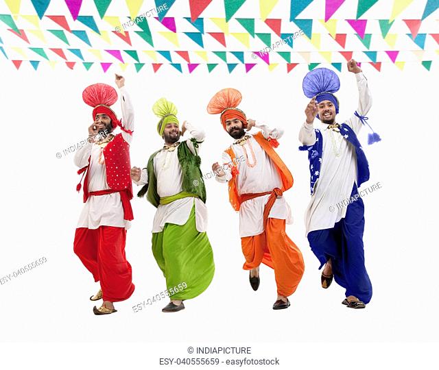 Sikh men dancing