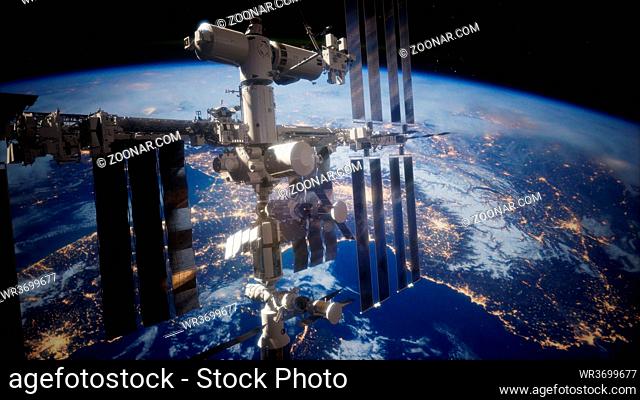 A view of the Earth and a spaceship. International space station is orbiting the Earth, Elements furnished by NASA