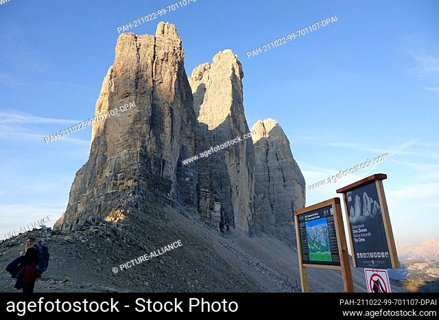 05 October 2021, Italy, Sexten: The Three Peaks (Italian: Tre Cime di Lavaredo) in the Sesto Dolomites in the sunshine. Photo: Alexandra Schuler/dpa