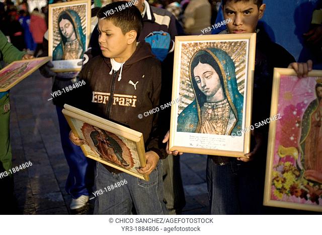 Young pilgrims carry an image of the Our Lady of Guadalupe outside of the Our Lady of Guadalupe Basilica in Mexico City, December 9, 2012