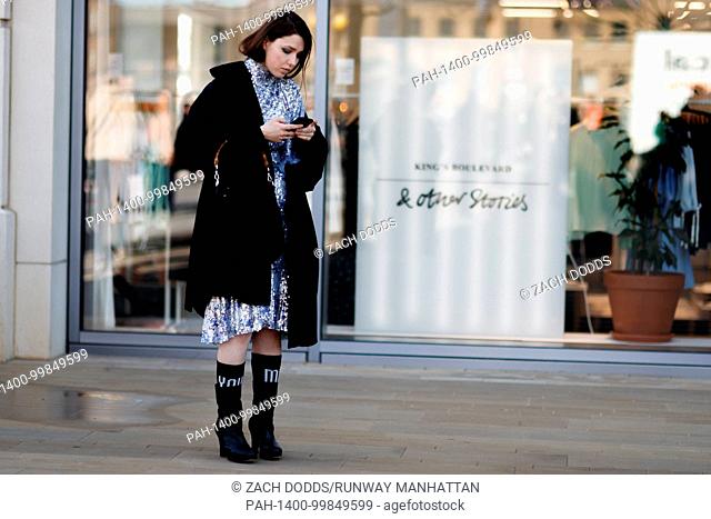 A chic showgoer outside the Toga runway show during London Fashion Week - Feb 17, 2018 - Photo: Runway Manhattan/Zach Dodds ***For Editorial Use Only*** |...