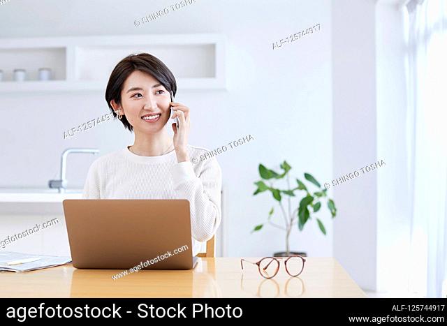 Japanese woman working from home