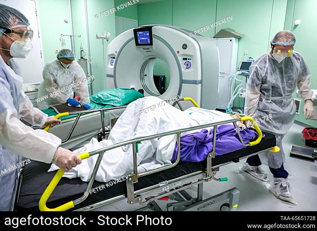 RUSSIA, ST PETERSBURG - DECEMBER 11, 2023: Medical workers deliver a COVID-19 ward patient to an MRI room at St George City Hospital