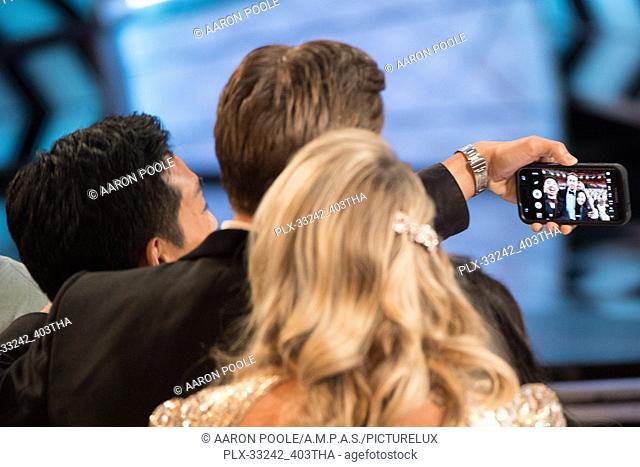 Tourists take a selfie with Ryan Gosling during The 89th Oscars® at the Dolby® Theatre in Hollywood, CA on Sunday, February 26, 2017