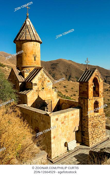 Svant Church nestled in its isolated location high up in the mountain side near Yeghegnadzor, Armenia