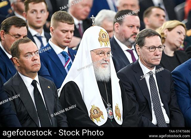RUSSIA, MOSCOW - FEBRUARY 21, 2023: Russian Security Council Deputy Chairman Dmitry Medvedev, Patriarch Kirill of Moscow and All Russia