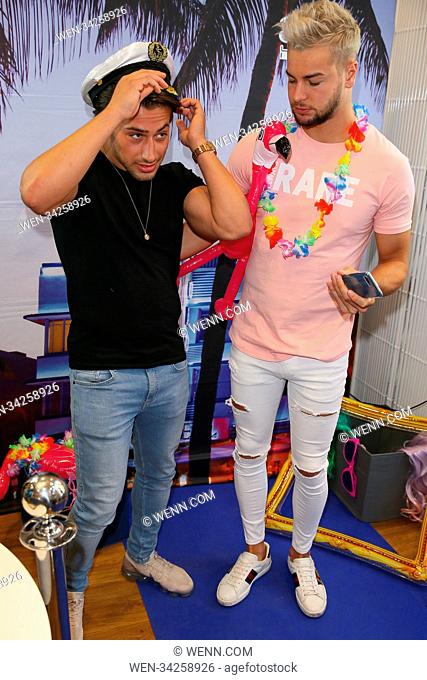 Chris Hughes and Kem Cetinay giving Selfie lessons as they promote the new Honor 10 phone at the Three Uk store - London Featuring: Kem Cetinay