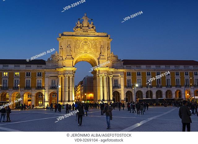 Triumphal Arch of Rua Augusta at dusk, Commerce Square. Lisbon, Portugal. Europe