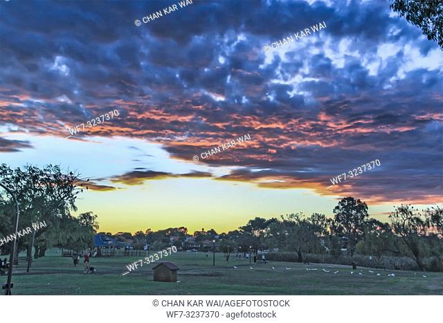 Perth - 2011: Sunset at a park with dark clouds suggesting a storm coming