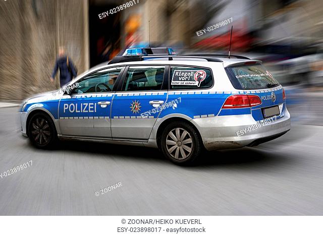 police car during a police operation in the cente