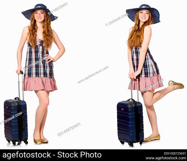 Young woman with suitcase isolated on white
