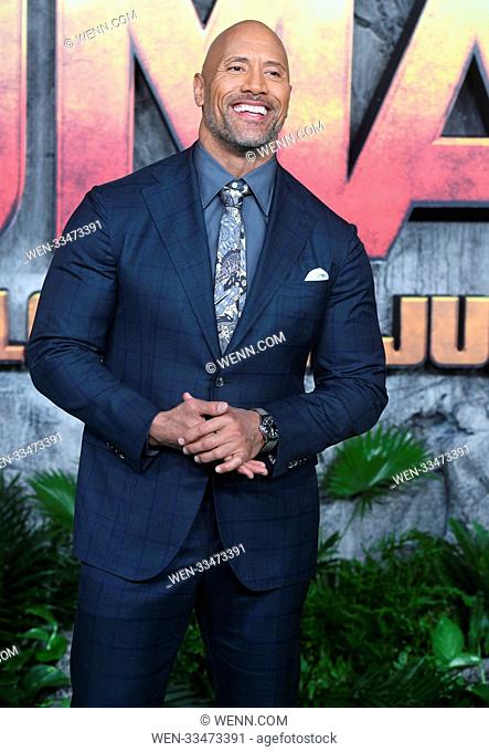 ****FILE PHOTOS** Wrestler-turned-actor {Dwayne 'The Rock' Johnson} will celebrate Christmas as a new father-to-be. The Fate of the Furious star and his...
