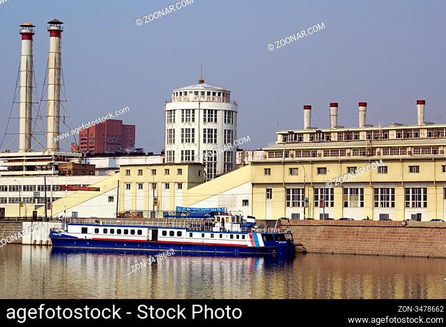 Ship, factory and Moscow river in Russia