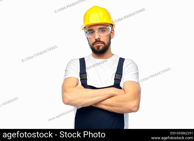 male worker or builder with crossed arms
