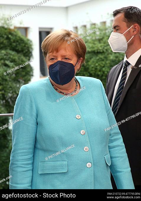 22 July 2021, Berlin: Federal Chancellor Angela Merkel (CDU) comes to the Federal Press Conference. She answered the questions of the capital's journalists