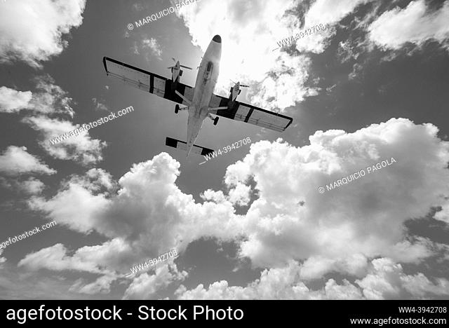 Small plane taking off on the tourist Maho beach in Sint Marteen, Netherlands Antilles