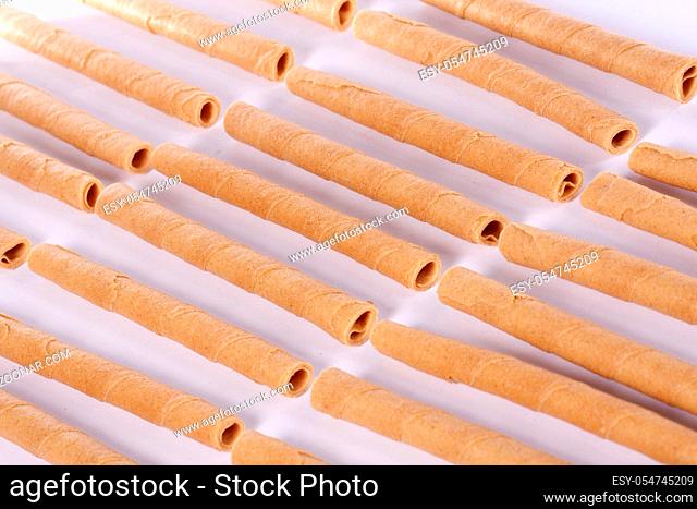 Close up view of a bunch of cookie sticks isolated on a white background