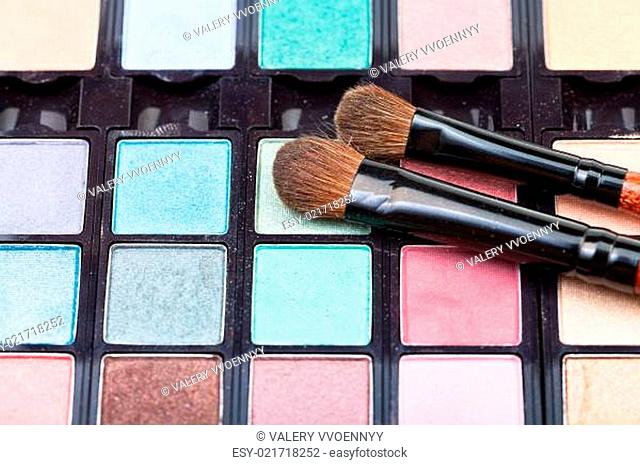 makeup kit and cosmetic brushes