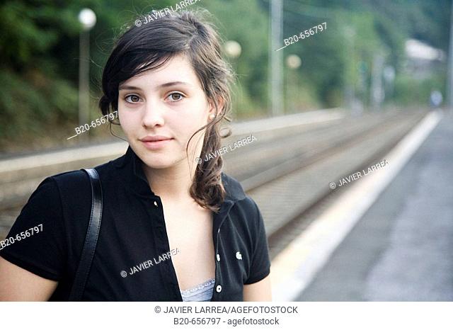 18 year old girl at train station. Legazpi, Guipuzcoa, Basque Country, Spain