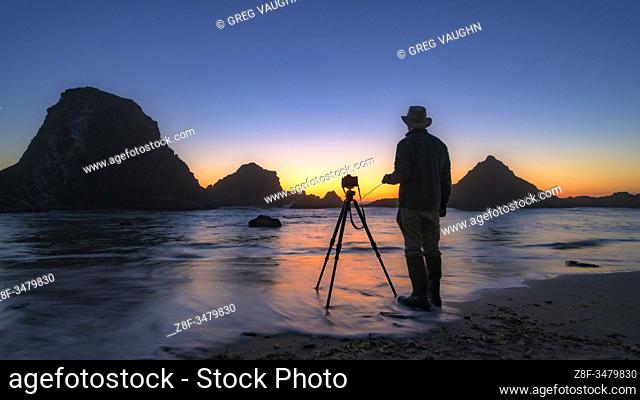 Alex Morley photographing sea stacks at sunset at Seal Rock State Park, central Oregon Coast