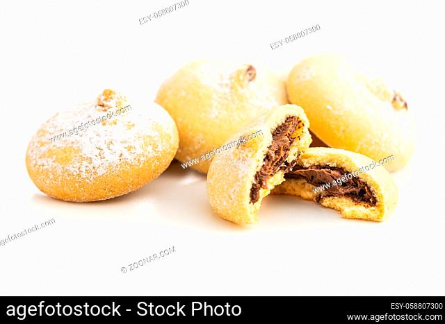 Cookies with chocolate cream. Sweet biscuits isolated on white background