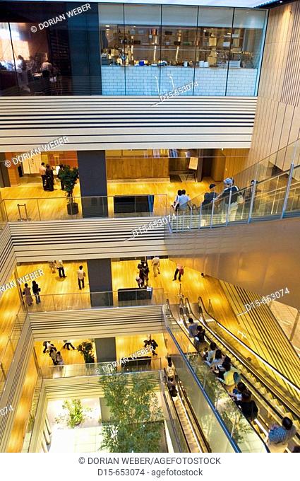 The newly opened Tokyo Midtown in Roppongi. Escalators connecting the 4 Levels of the Galleria, an open Foyer Arcade with modern shops, cafes and restaurants