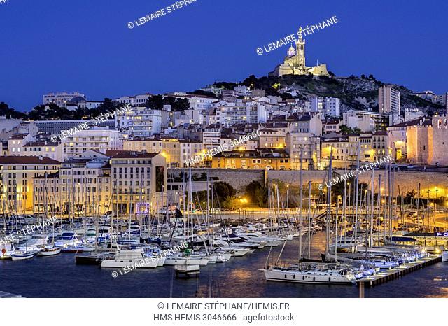 France, Bouches du Rhône, Marseille, Old Port, Rive Neuve wharf, Notre Dame de la Garde basilica at the backg