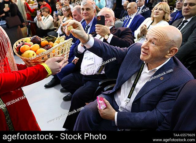 RUSSIA, MOSCOW - DECEMBER 9, 2023: Moscow Commerce and Industry Chamber President Vladimir Platonov visits a stand of the Kabardino-Balkaria Republic at the...