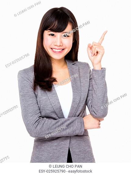 Asian businesswoman with finger point up