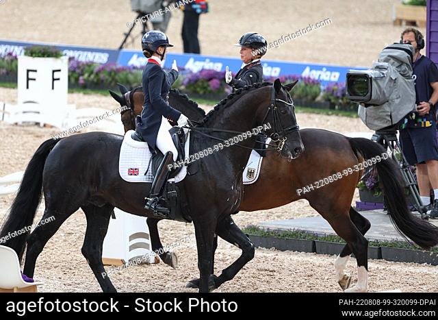 08 August 2022, Denmark, Herning: Equestrian sport: World Championships, Dressage, Grand Prix Special. Dressage rider Charlotte Fry (l