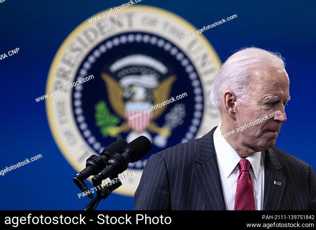 US President Joe Biden turns away from the podium after delivering remarks on the US response to the coup in Myanmar, in the Eisenhower Executive Office...